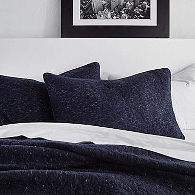 DKNY Speckled Jersey Twin Quilt in Navy. View a larger version of this product image.