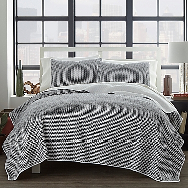 City Scene&reg; Leaves 3-Piece Reversible Full/Queen Quilt Set in Black. View a larger version of this product image.