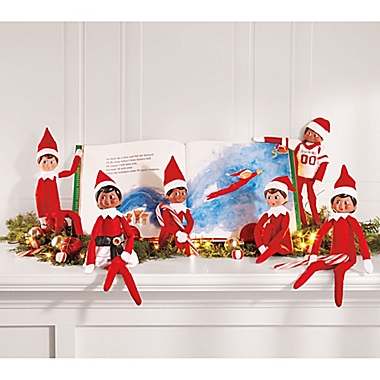 The Elf on the Shelf&reg; A Christmas Tradition Book Set with Light Skin Tone Boy Elf. View a larger version of this product image.