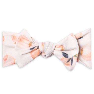 Copper Pearl&trade; Peach Print Bow Headband. View a larger version of this product image.