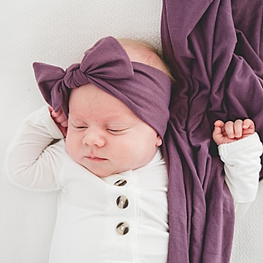 Copper Pearl&trade; One Size Knit Bow Headband in Plum. View a larger version of this product image.