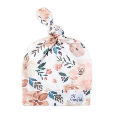 Copper Pearl&trade; Size 0-4M Autumn Top Knot Hat in White/Pink. View a larger version of this product image.