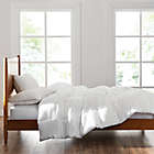 Alternate image 1 for UGG&reg; Devon Down Alternative Quilted King Comforter in White
