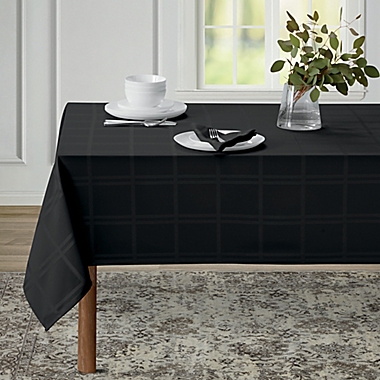 Wamsutta&reg; Solid 60-Inch x 120-Inch Oblong Tablecloth in Black. View a larger version of this product image.
