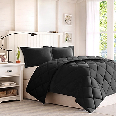 Madison Park Essentials Larkspur 3M Scotchgard 3-Piece Full/Queen Comforter Set in Black. View a larger version of this product image.