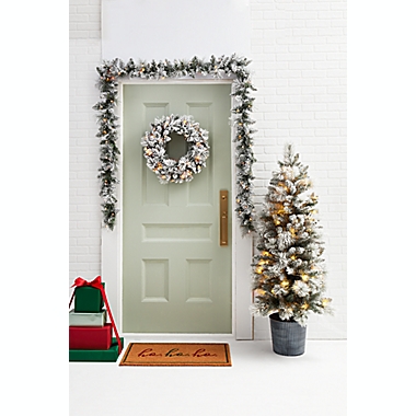 Bee &amp; Willow&trade; 24-Inch Modern Flocked Artificial Pre-Lit LED Wreath in Green/White. View a larger version of this product image.