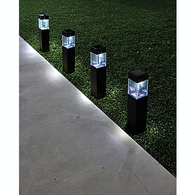 Simply Essential&trade; Modern Outdoor Solar LED Pathway Markers in Black (Set of 6). View a larger version of this product image.