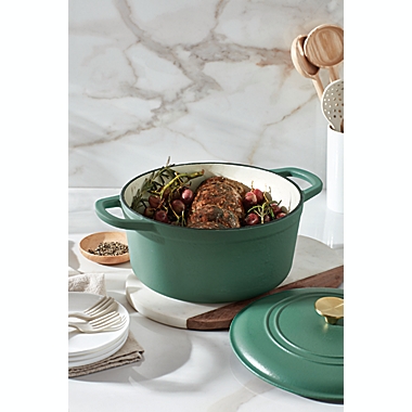 Our Table&trade; 6 qt. Enameled Cast Iron Dutch Oven with Gold Lid Knob in Dark Ivy. View a larger version of this product image.