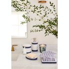 Alternate image 2 for Everhome&trade; Dogwood & Dahlia 9 oz. Jar Candle with Lid in Indigo