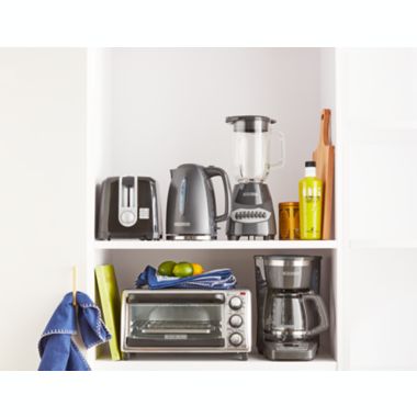 Black &amp; Decker&trade; 4-Slice Toaster Oven in Grey. View a larger version of this product image.