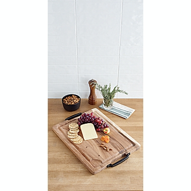 Our Table&trade; 15-Inch x 20-Inch Acacia Carving Board with Handles. View a larger version of this product image.