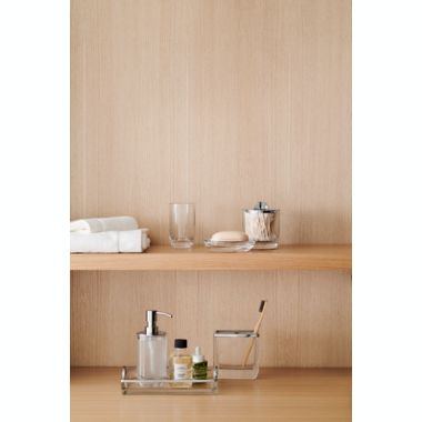 The Threadery&trade; Curved Glass Soap/Lotion Dispenser in Clear. View a larger version of this product image.