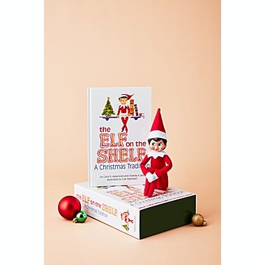 The Elf on the Shelf&reg; A Christmas Tradition Book Set with Light Skin Tone Girl Elf. View a larger version of this product image.