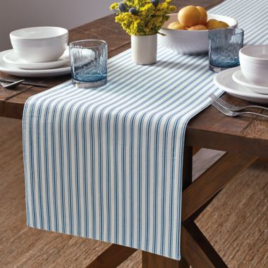 Bee &amp; Willow&trade; Daisy Floral Bouquet/Ticking Stripe 72-Inch Reversible Table Runner. View a larger version of this product image.