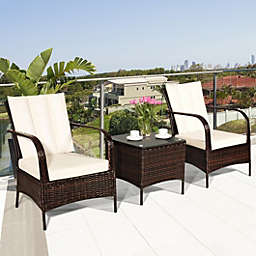 Costway-CA 3 Pcs Patio Conversation Rattan Furniture Set with Glass Top Coffee Table and Cushions-White