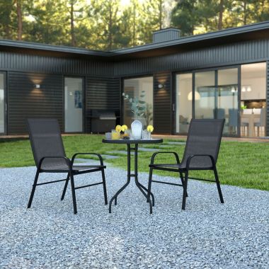 Flash Furniture Brazos 3 Piece Outdoor Patio Dining Set - 23.75" Round Tempered Glass Patio Table, 2 Black Flex Comfort Stack Chairs. View a larger version of this product image.