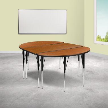 Emma and Oliver 3 Piece 76" Oval Wave Collaborative Oak Adjustable Activity Table Set. View a larger version of this product image.