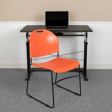 Flash Furniture HERCULES Series 5 Pack 880 lb. Capacity Orange Ultra-Compact Stack Chair with Black Powder Coated Frame. View a larger version of this product image.