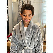 Thera kids unisex weighted robe in soothing gray color for stress and anxiety relief. Breathable soft plush  premium fabric and construction - leak free cooling beads-machine washable for easy care.