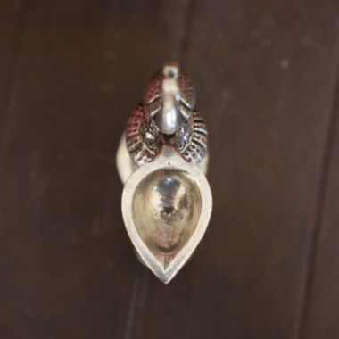 Cottage Handicraft, Silver Plated Peacock Diya with free Elephant Gift. View a larger version of this product image.