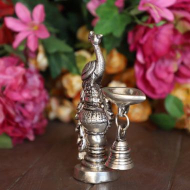 Cottage Handicraft, Silver Plated Peacock Diya with free Elephant Gift. View a larger version of this product image.