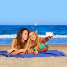 Alternate image 1 for PiccoCasa Quick Dry Microfiber Solid Beach Towel XL Sand-free Lightweight Absorbent Travel Towels 30 x 60 Inch with Clip- for Beach Swim Camping Yoga Sports Dark Blue