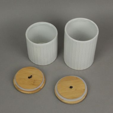 Things2Die4 Set of 2 White Ceramic Jars With Wood Lids Decorative Kitchen Counter Canisters. View a larger version of this product image.