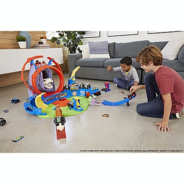 Hot Wheels Monster Trucks T-Rex Volcano Arena Playset with Lights & Sounds, Includes 2 Launchers, 1 Monster Truck & 1 Car, Gift for Kids Ages 3 Years & Older. View a larger version of this product image.