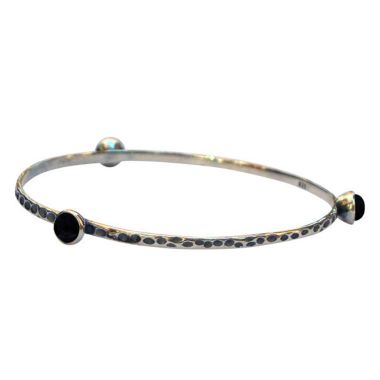 Bottled Up Designs Rustic Bangle In Sterling Silver. View a larger version of this product image.