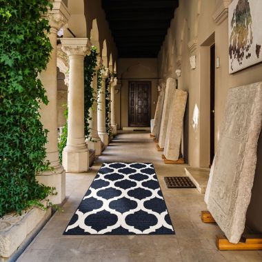 Chaudhary Living 2.5' x 5' Navy Blue and Off White Moroccan Rectangular Outdoor Area Throw Rug. View a larger version of this product image.