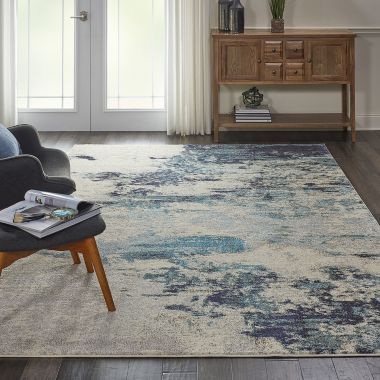 Celestial CES02 Area Rug Colorful Contemporary Abstract By Nourison Ivory Teal Blue 6' x 9'. View a larger version of this product image.