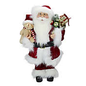 Northlight 16" Red and White Standing Santa Claus Christmas Figure with Present Bag