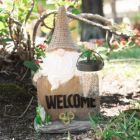 Alternate image 1 for VP Home Welcome Gnome with Lantern and Frog Solar Powered LED Outdoor Decor Garden