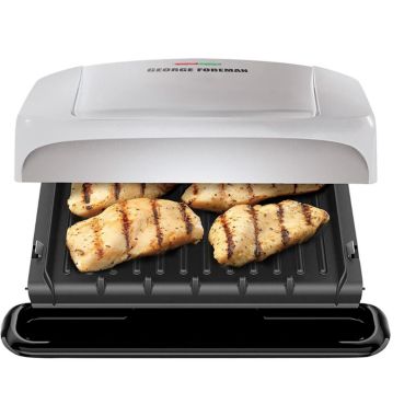 George Foreman 4 Serving Electric Indoor Grill and Panini Press in Silver. View a larger version of this product image.