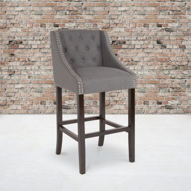 Flash Furniture Carmel Series 30" High Transitional Tufted Walnut Barstool with Accent Nail Trim in Dark Gray Fabric. View a larger version of this product image.