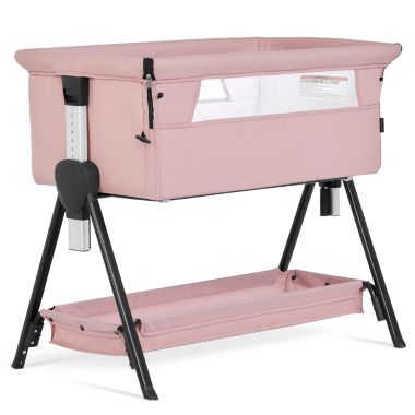 Dream On Me Lilly Bassinet & Bedside Sleeper In Pink. View a larger version of this product image.