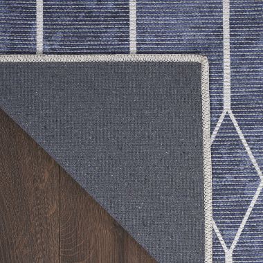 Nicole Curtis Machine Washable Series 1 5'3" x 7'3" Navy Modern Indoor Rug. View a larger version of this product image.
