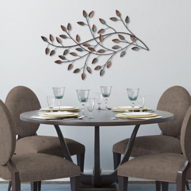 HomeRoots Home Decor Distressed Metal Blowing Leaves Wall Decor - 321353. View a larger version of this product image.