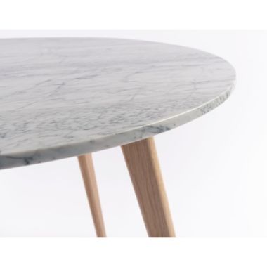 The Bianco Collection Avella 31" Round Italian Carrara White Marble Dining Table with Oak Legs. View a larger version of this product image.