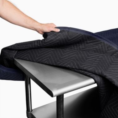 Sure-Max Moving & Packing Blanket - Pro Economy - 80" x 72" (35 lb/dz weight) - Professional Quilted Shipping Furniture Pad Navy Blue and Black. View a larger version of this product image.