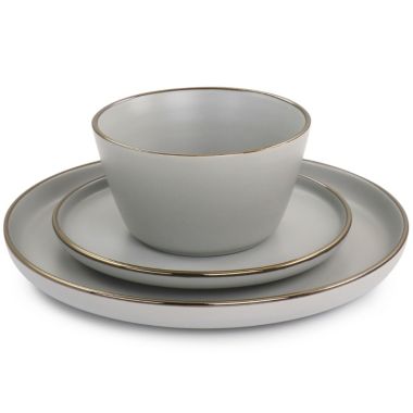 Elama Louis 16 Piece Stoneware Dinnerware Set in Matte Slate with Gold Rim. View a larger version of this product image.