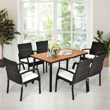 Costway 55" Patio Rattan Dining Table with Umbrella Hole. View a larger version of this product image.