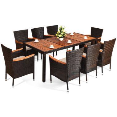 Costway 9 Pieces Patio Rattan Dining Set with Stackable Chairs Cushioned and Acacia Wood Table Top. View a larger version of this product image.