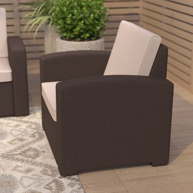 Merrick Lane Malmok Outdoor Furniture Resin Chair Chocolate Brown Faux Rattan Wicker Pattern Patio Chair With All-Weather Beige Cushion. View a larger version of this product image.