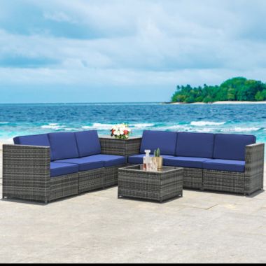 Costway 8 Piece Wicker Sofa Rattan Dinning Set Patio Furniture with Storage Table-Navy. View a larger version of this product image.