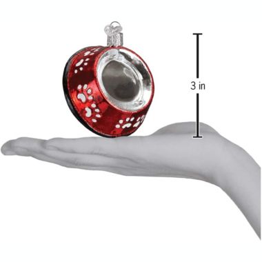 Old World Christmas 32285 Glass Blown Dog Bowl Ornament. View a larger version of this product image.