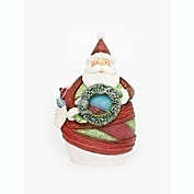 Roman 6.5" Red and White Striped Yarn Wrapped Santa Claus with Wreath Christmas Figurine