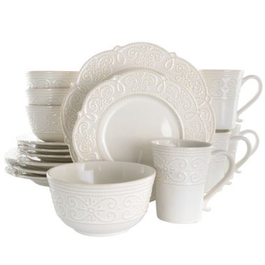 Elama Luna 16 Piece Embossed Scalloped Stoneware Dinnerware Set in White. View a larger version of this product image.