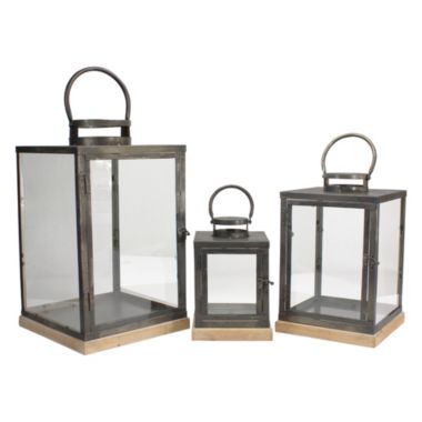 Melrose Set of 3 Bronze Glass Candle Lanterns With a Latch Hook Lock - 21". View a larger version of this product image.