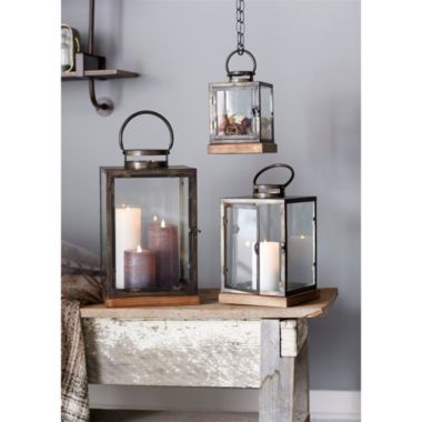 Melrose Set of 3 Bronze Glass Candle Lanterns With a Latch Hook Lock - 21". View a larger version of this product image.